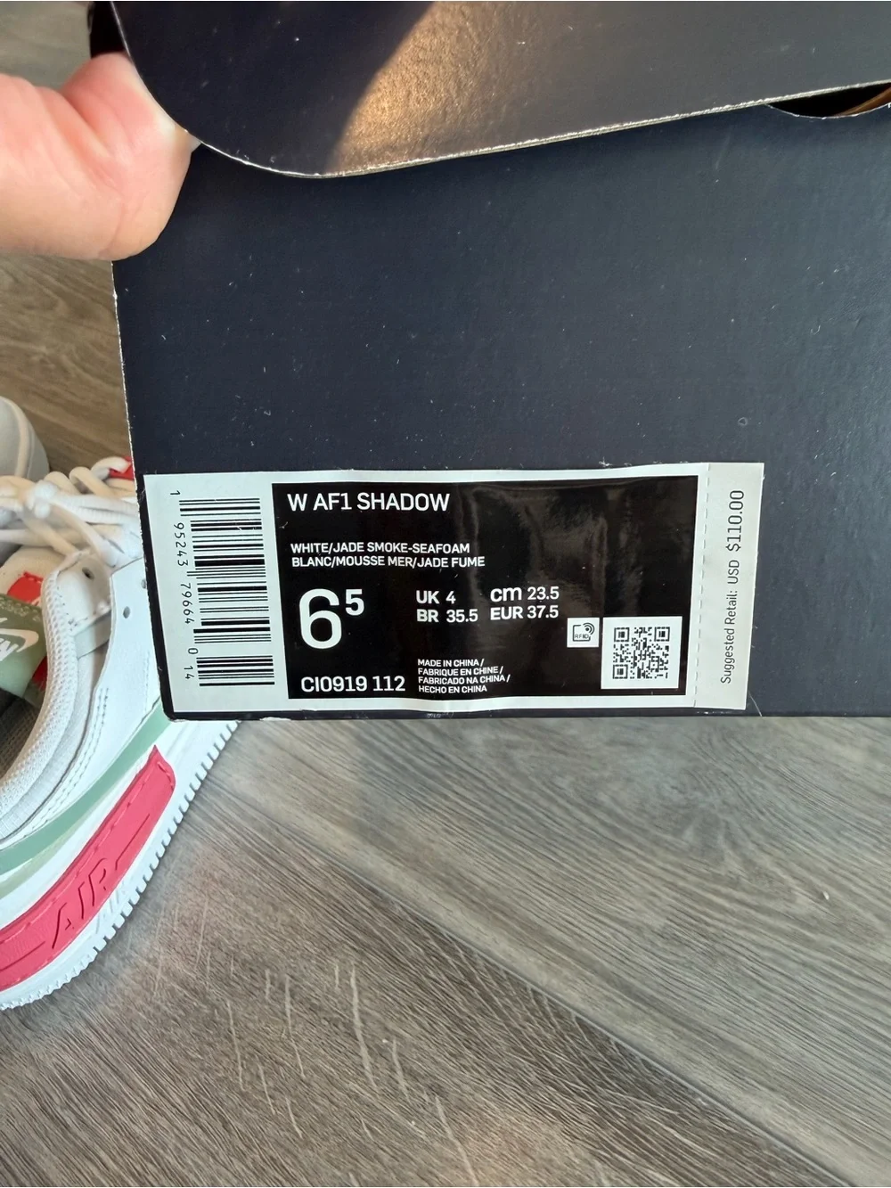 Nike Kids White Sneakers with Sage Green and Pink Accents